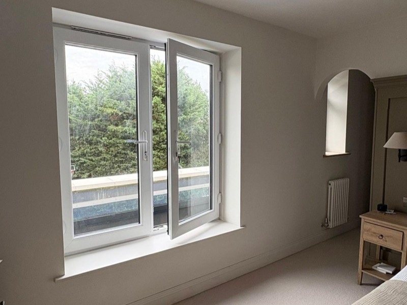 French windows opening onto a flat roof